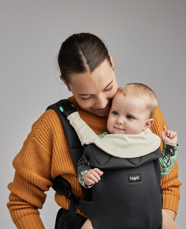 najell zascita za otroske nosilke slonokosceno bela1